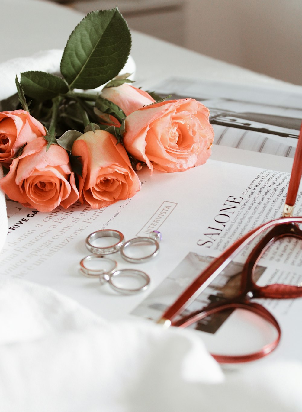 pink roses on white paper