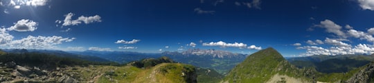 green grass field under blue sky during daytime in Pichl Austria