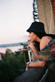 woman smoking weed rooftop