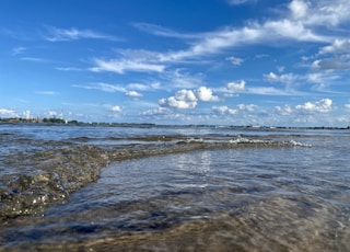 blue sky and white clouds over sea