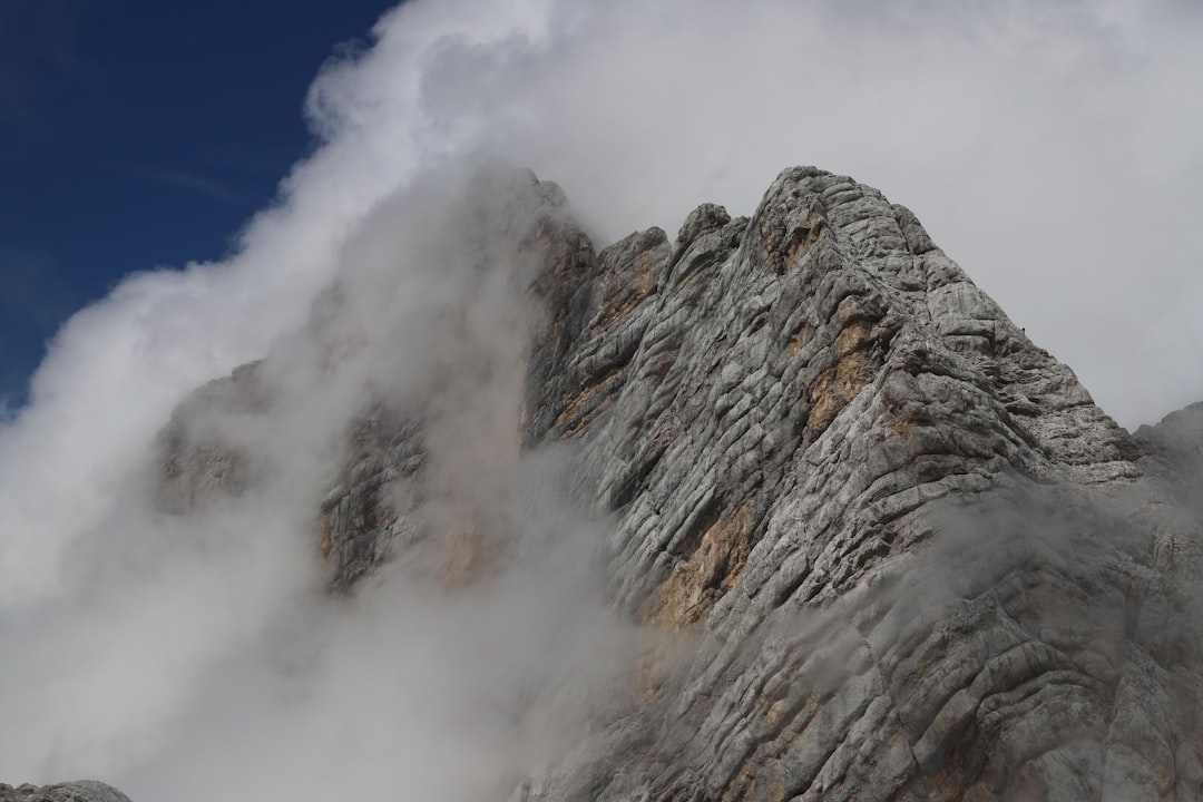 gray mountain under blue sky during daytime