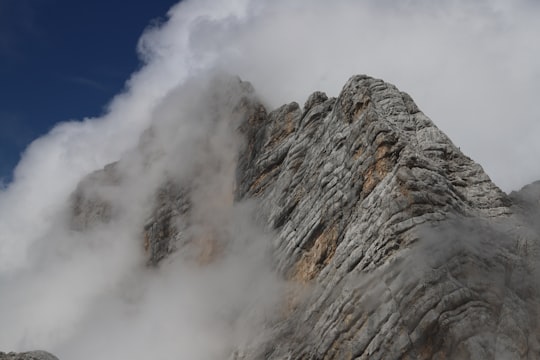 gray mountain under blue sky during daytime in Obertraun Austria