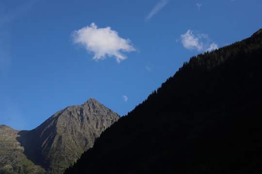 green trees on mountain under blue sky during daytime in Rohrmoos-Untertal Austria