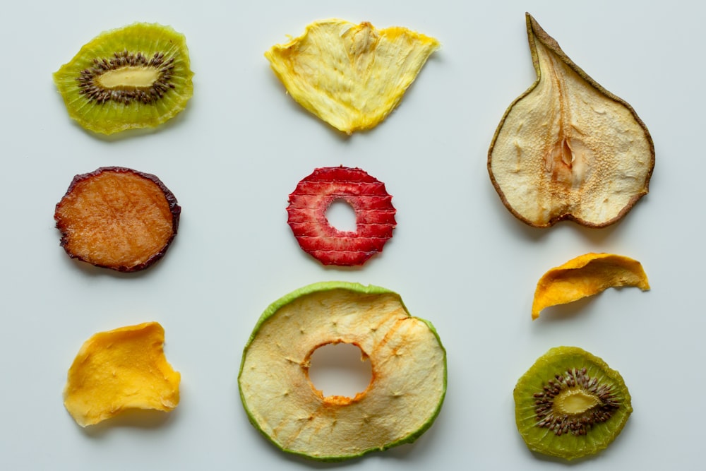 sliced apple and red round fruit