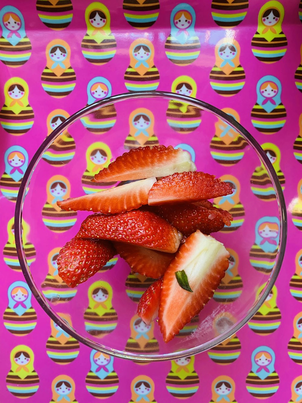 sliced orange fruit on purple and white ceramic plate