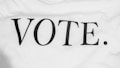 Bold black lettering spells out the word 'VOTE.' on a plain white background. The typography is simple and clear, conveying a direct message.
