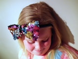 A cheerful headband adorned with a large, colorful bow.
