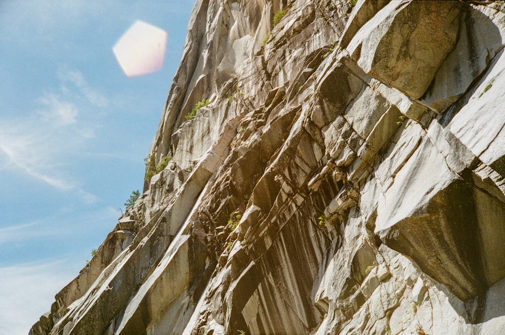 brown rocky mountain under blue sky during daytime