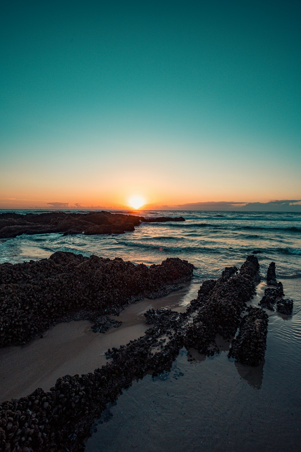 body of water during sunset photo – Free Nature Image on Unsplash