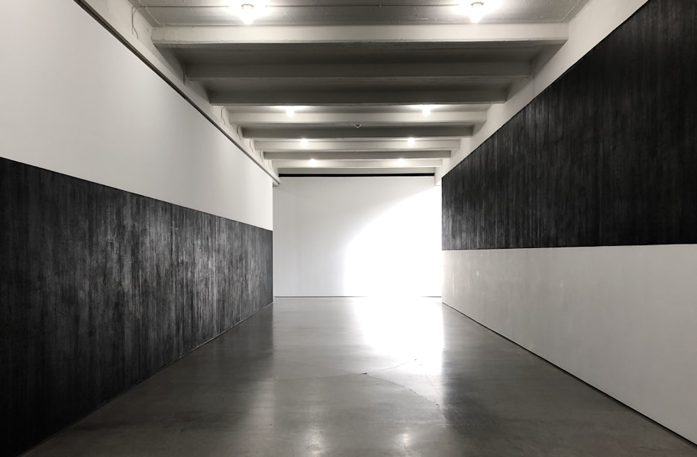 white and gray hallway with white walls