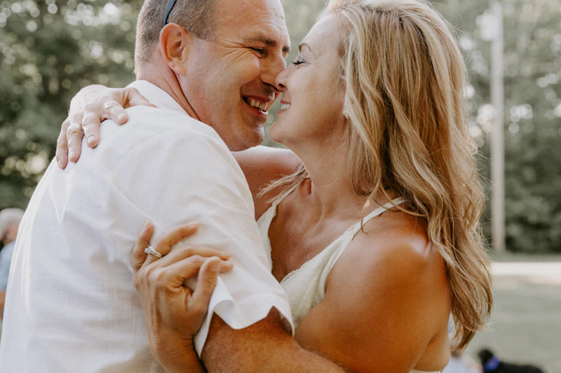 Man and woman kissing outdoors