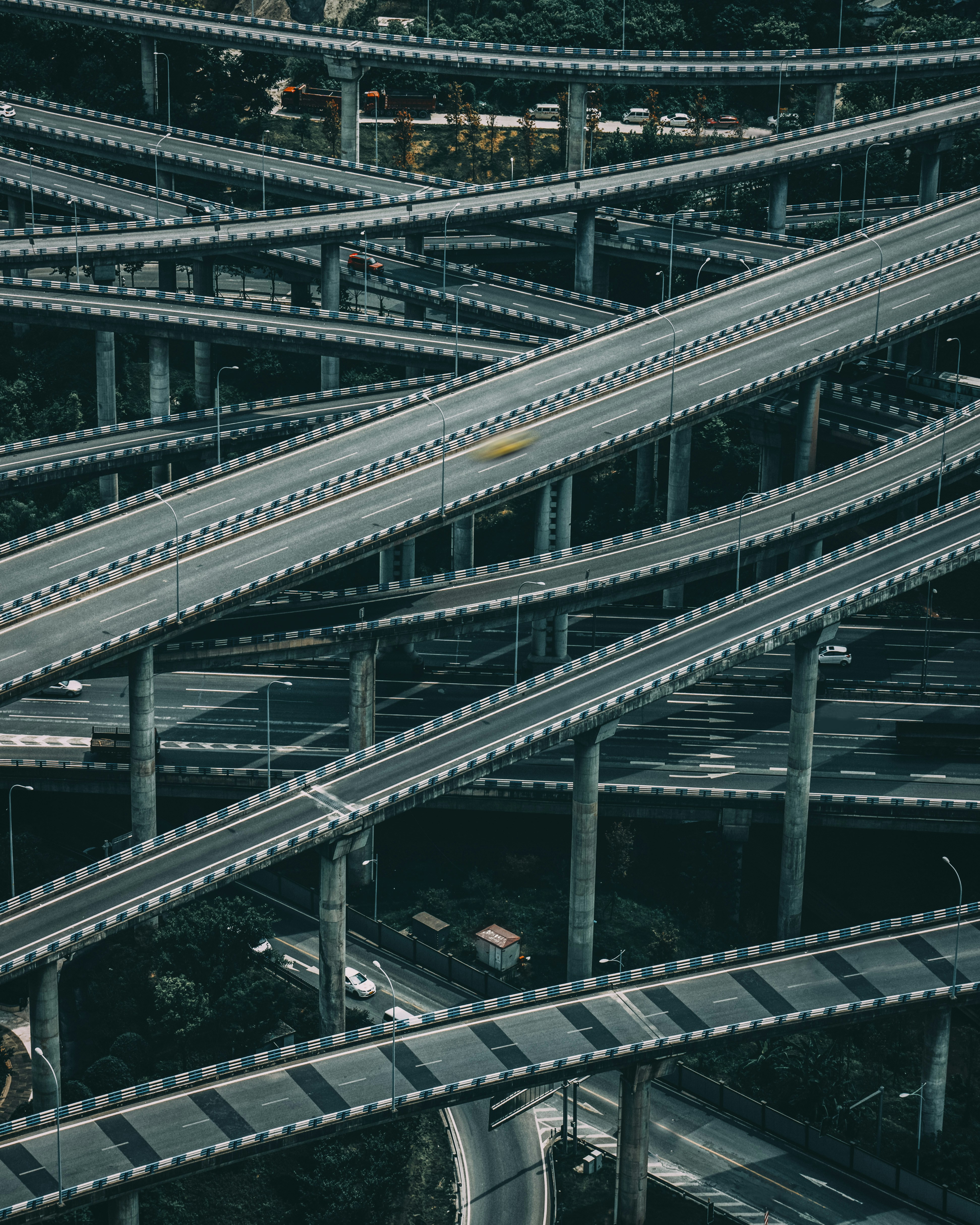 gray metal bridge during night time