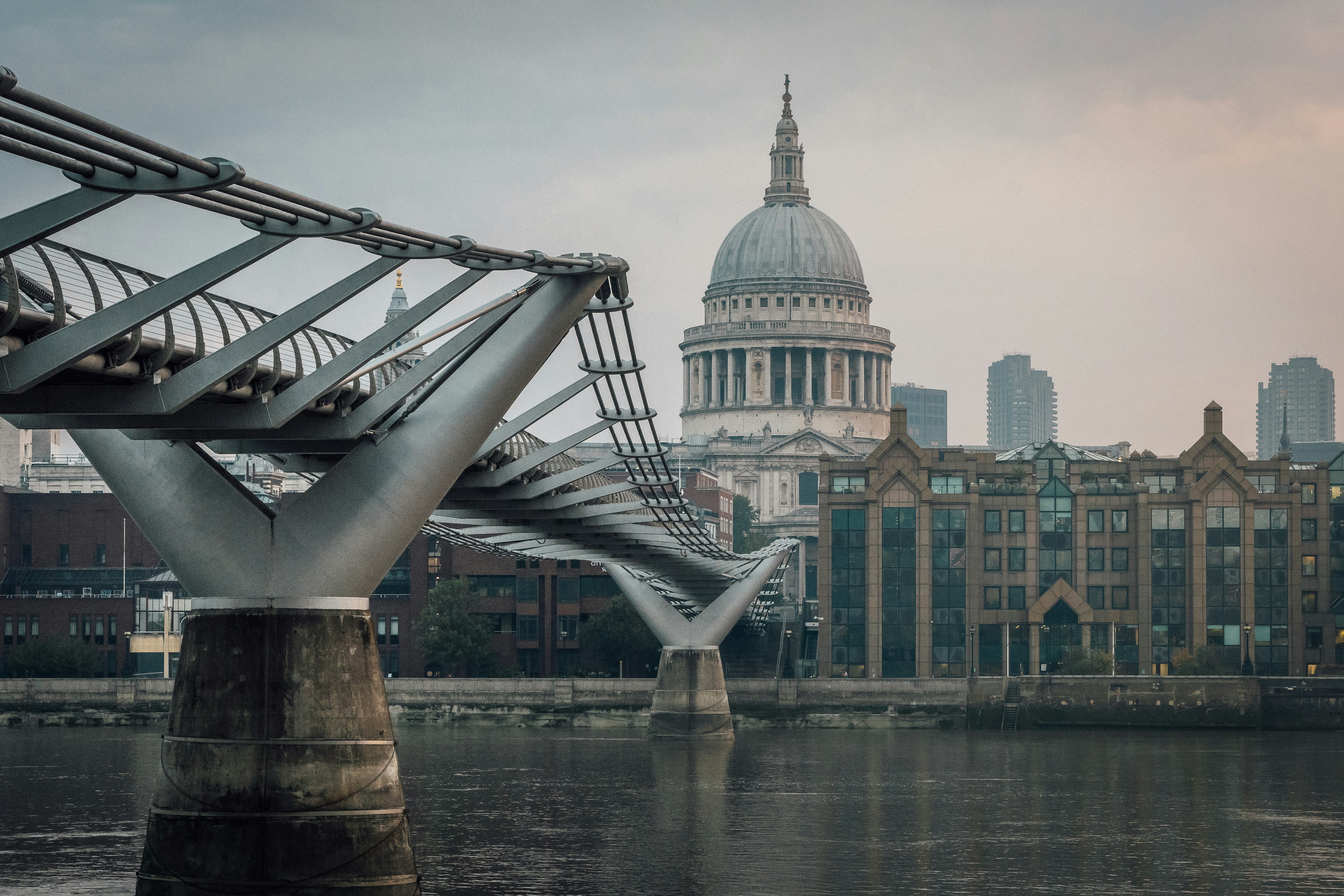 The view from the east river of London towards the millennium bridge and St.Pauls Cathedral.