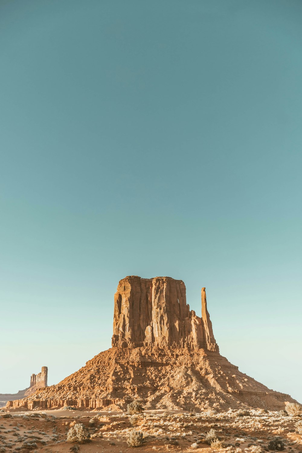 brown rock formation under blue sky during daytime