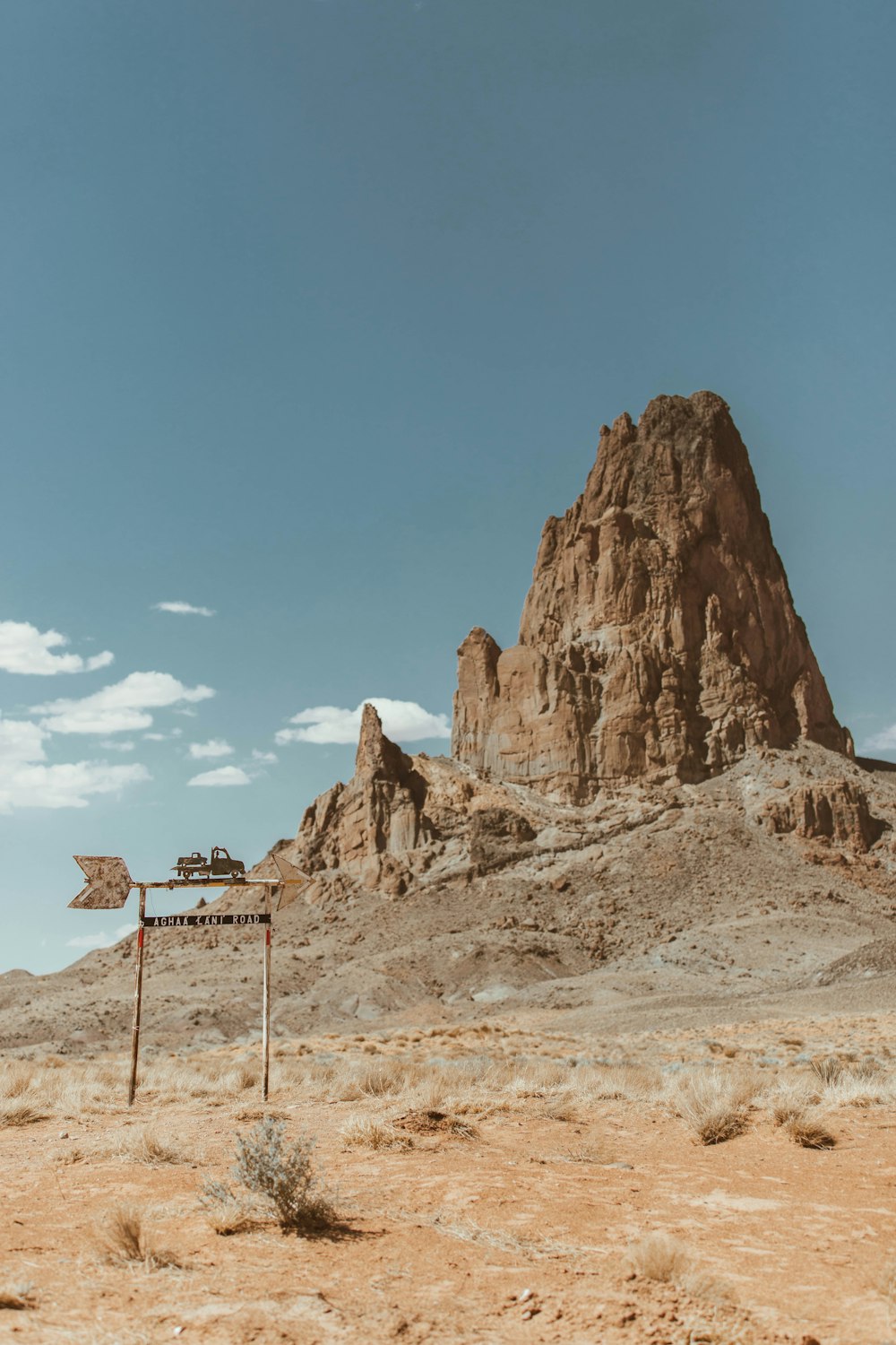 brown rock formation under blue sky during daytime