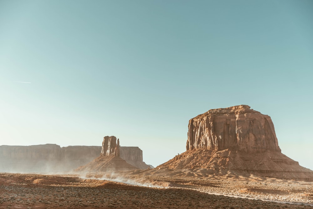 brown rock formation under blue sky during daytime