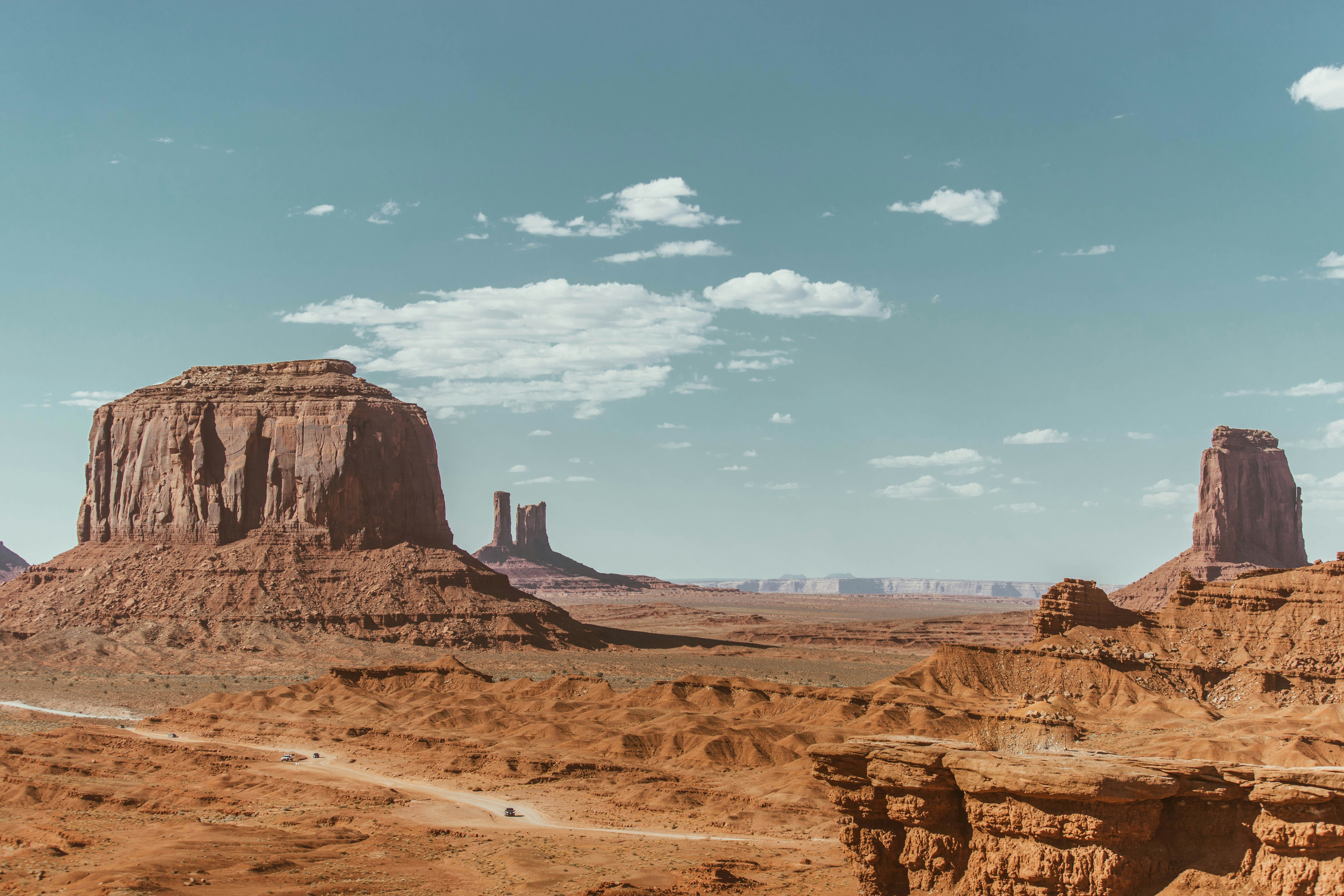 brown rock formation under blue sky during daytime