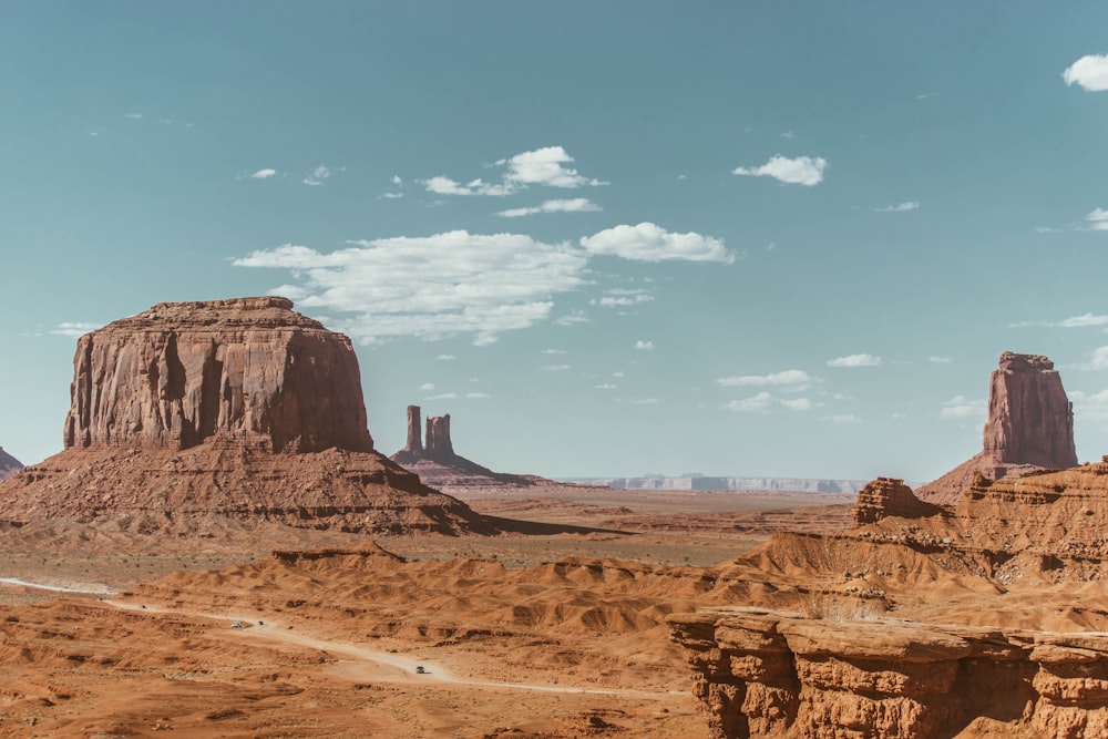 brown rock formation under blue sky during daytime