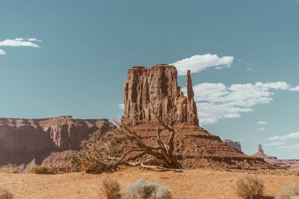 brown rock formation under blue sky during daytime