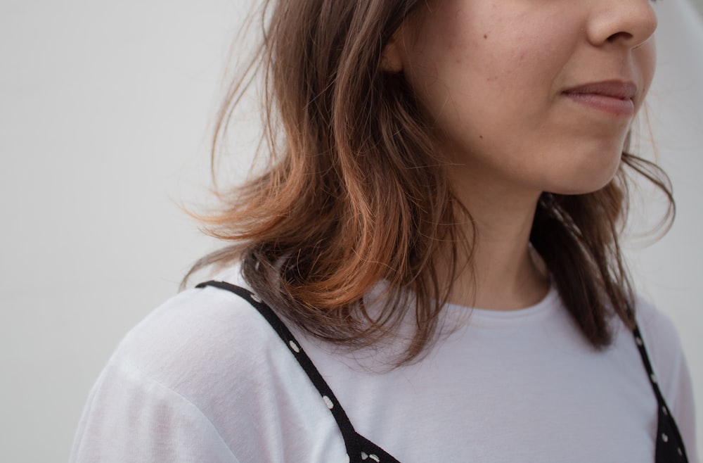 woman in white crew neck shirt