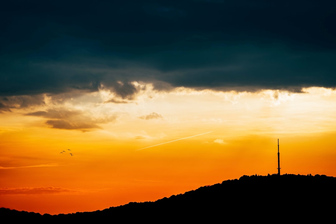 silhouette of mountain during sunset