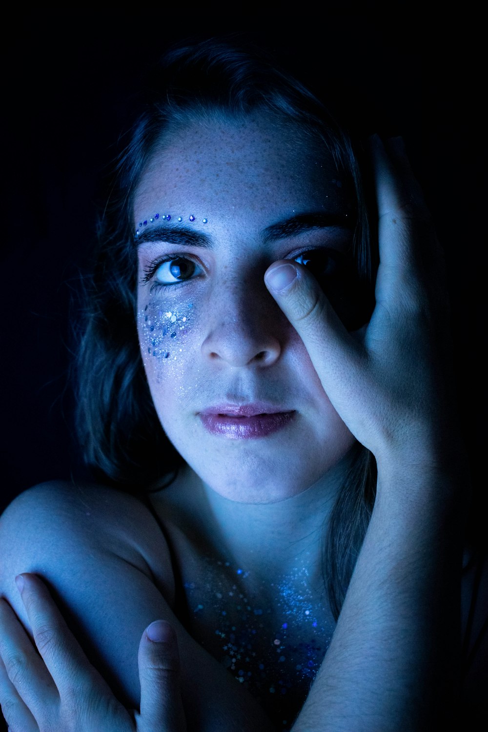 woman with blue eyes and black hair