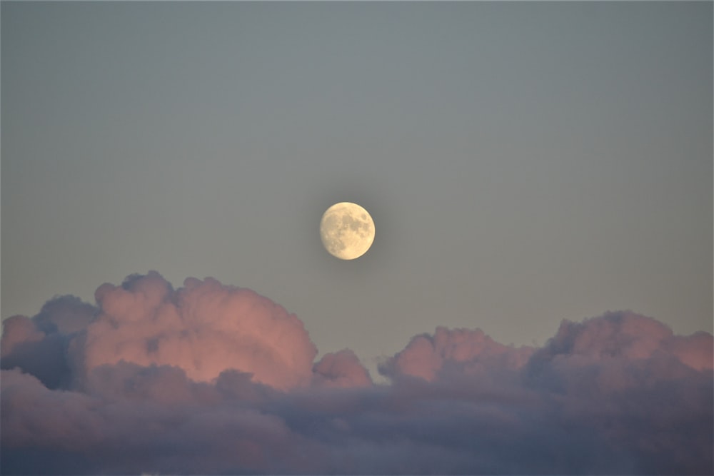 full moon over the clouds