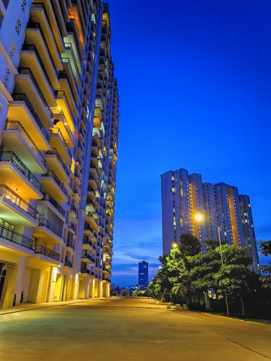 brown concrete building during night time in Bangalore India