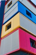 yellow blue and red concrete building