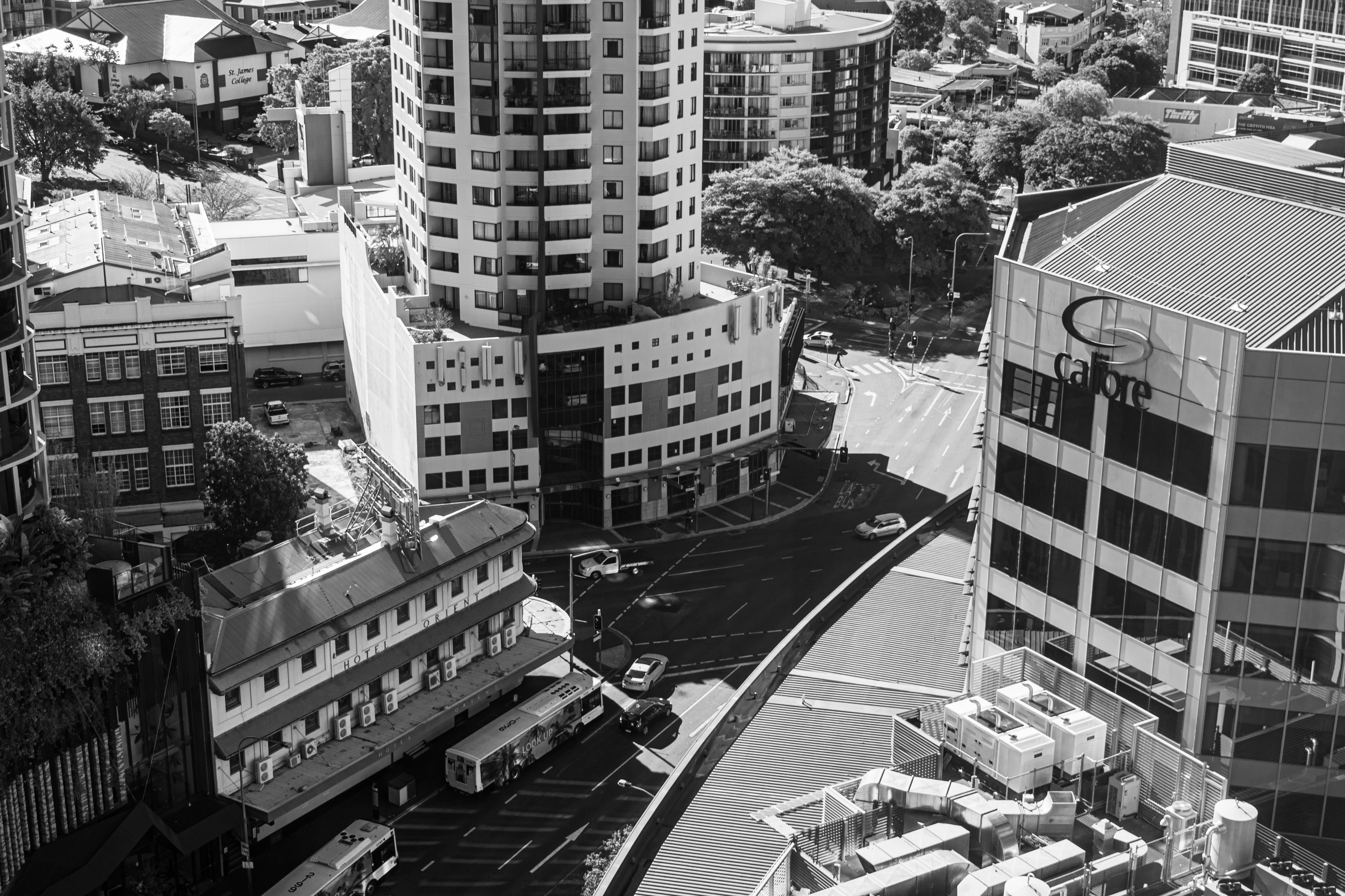 grayscale photo of city buildings