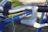 Close-up of a sleek veloforma bike frame with a blurred urban background.