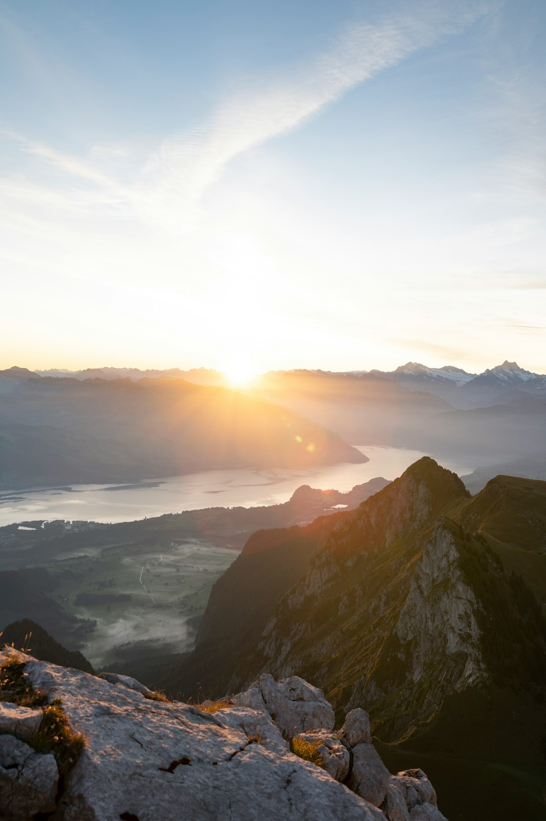 mountains and clouds during sunset