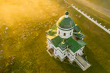 Aerial view of Akkaraipattu Muslim Central College campus bathed in golden sunlight.
