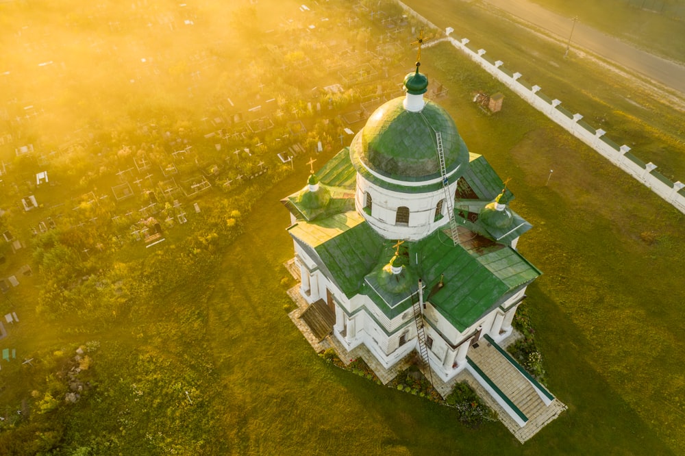 white and green dome building