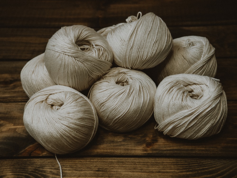 white garlic on brown wooden table