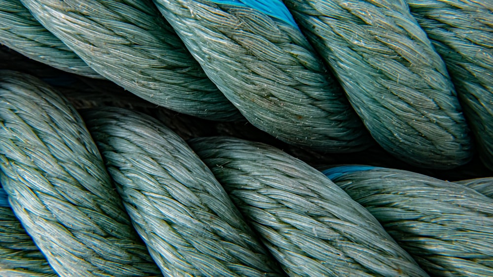 green and blue rolled textile