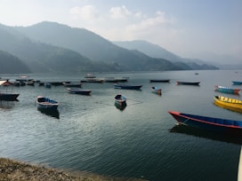 people riding on boat on sea during daytime
