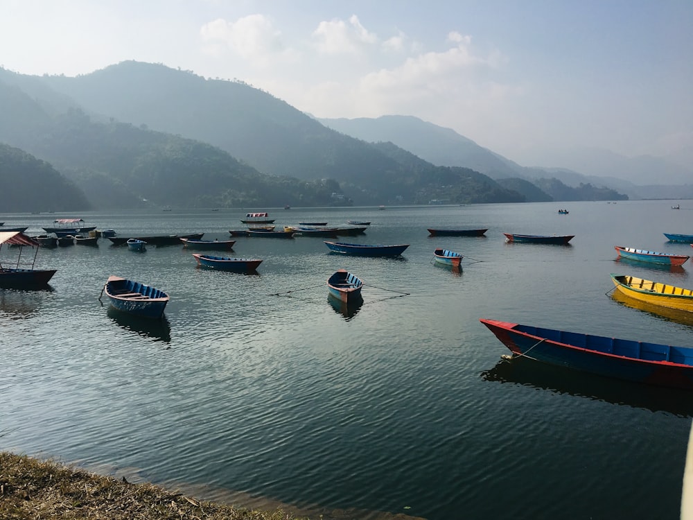 people riding on boat on sea during daytime