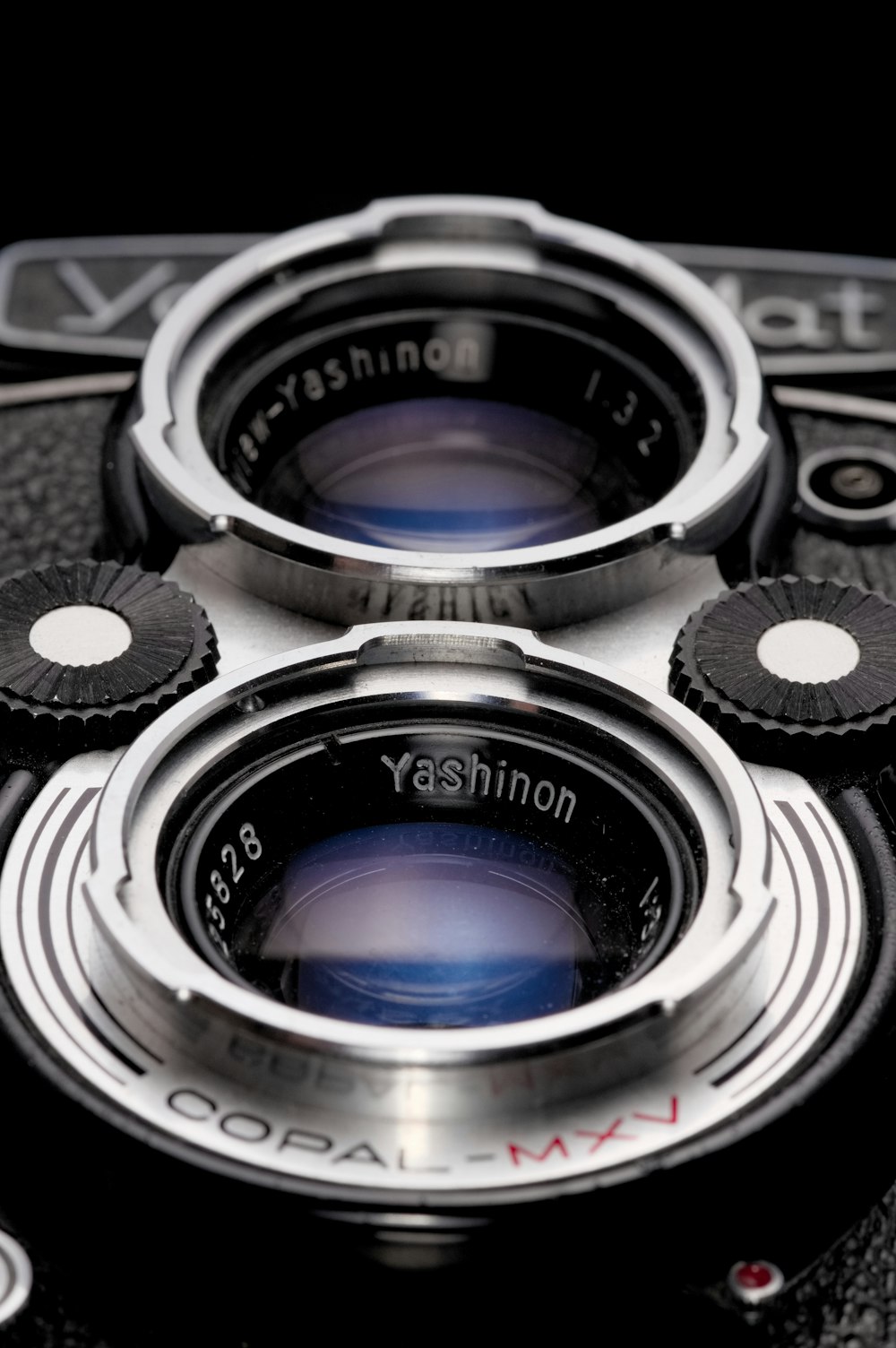 black and silver dslr camera lens