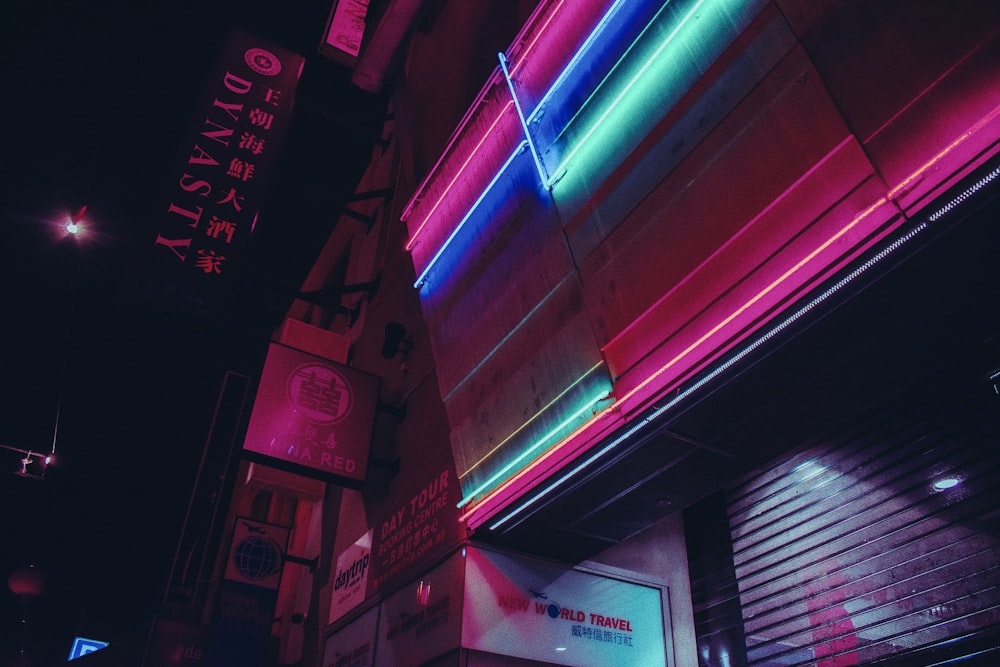 red and blue neon light signage