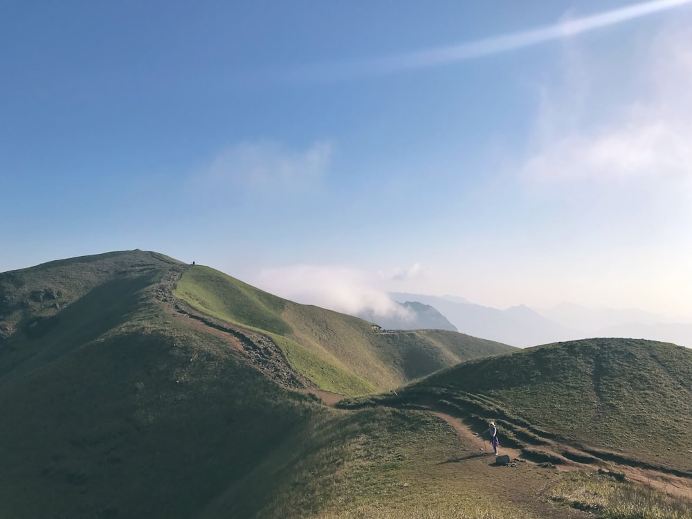 green mountains under blue sky during daytime