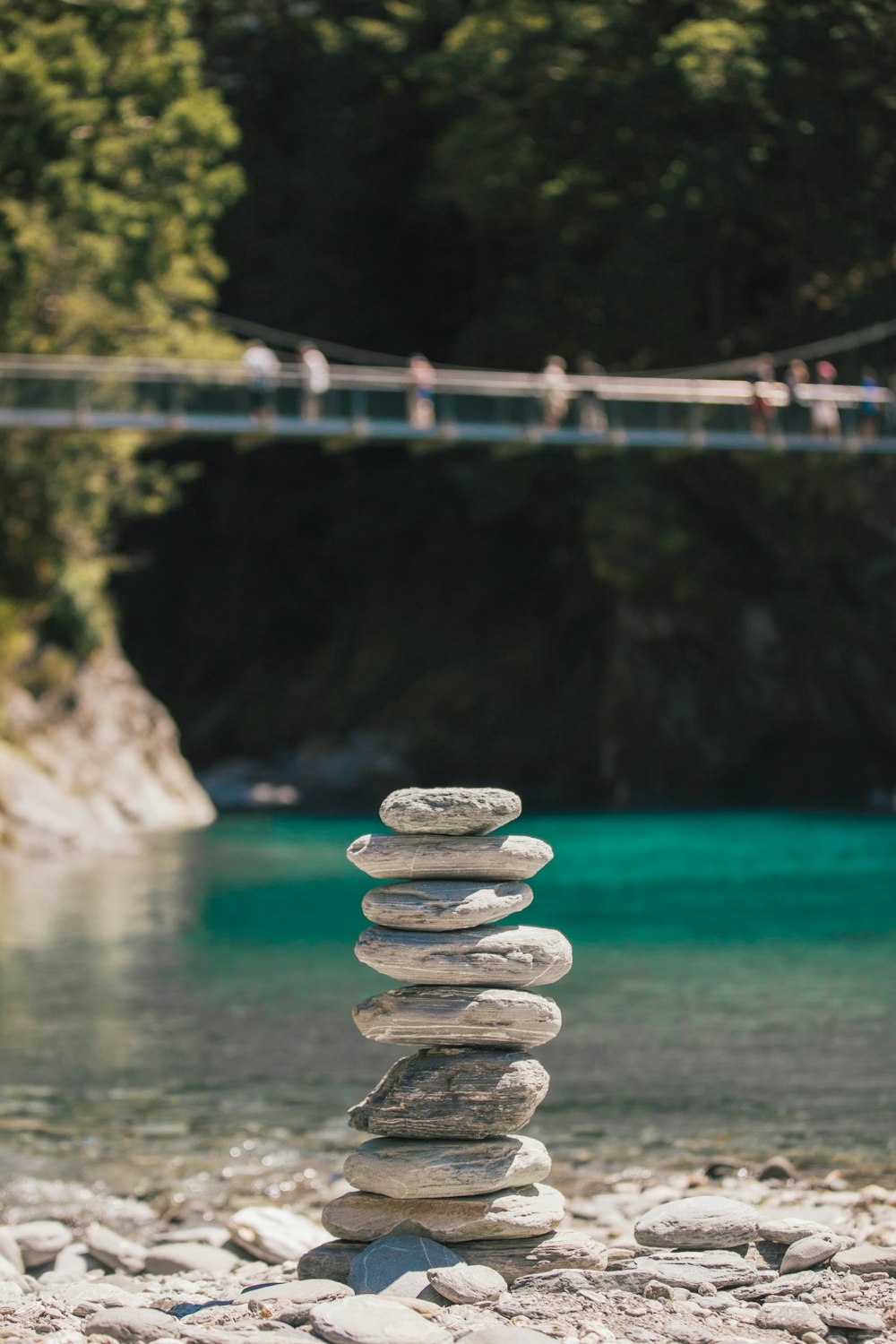 stack of silver round coins on blue water