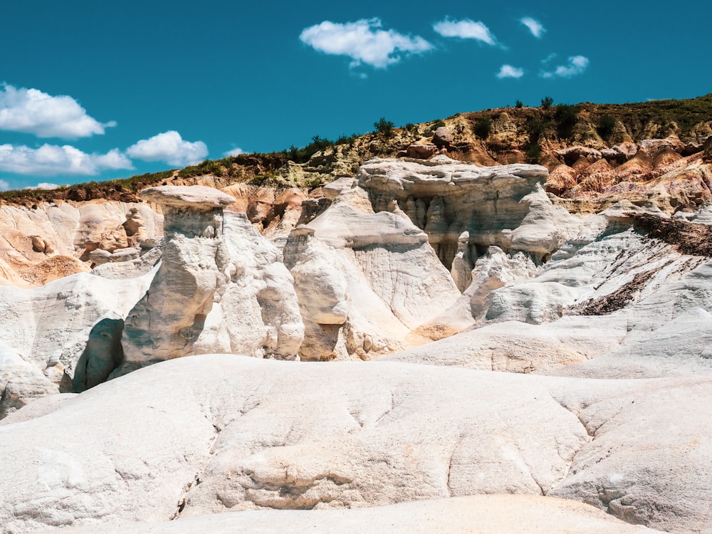 white and brown rocky mountain under blue sky during daytime