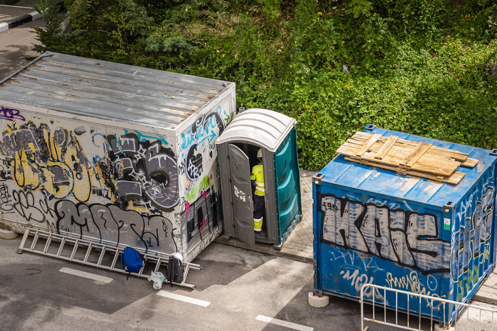 blue and white trash bins