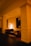 A cozy lounge area with comfortable seating and warm lighting.