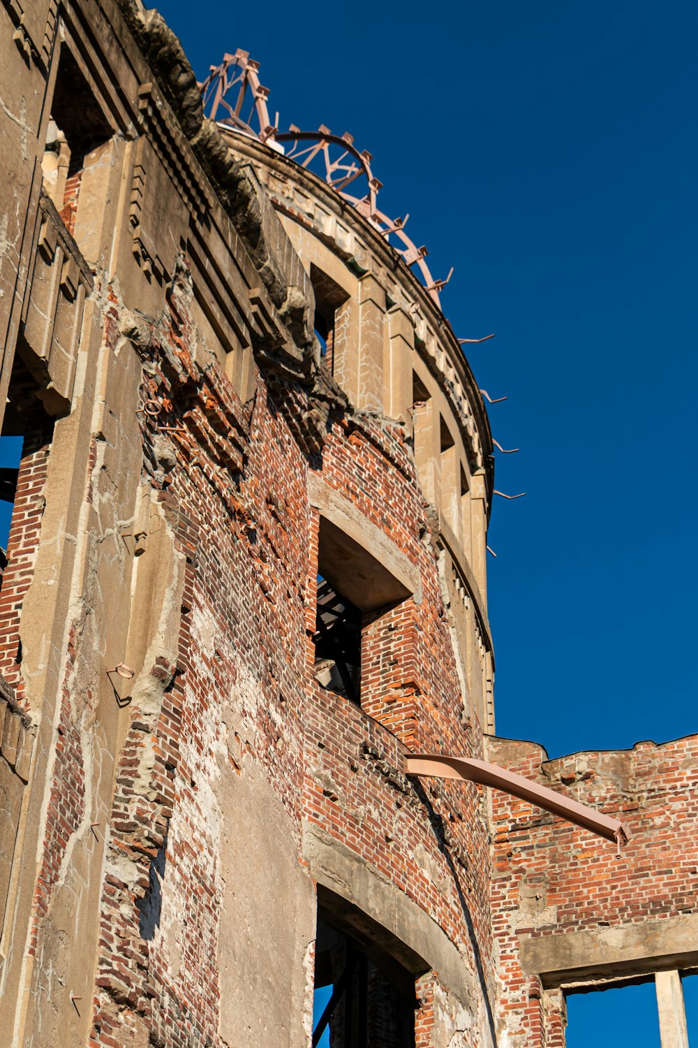 brown concrete building under blue sky during daytime