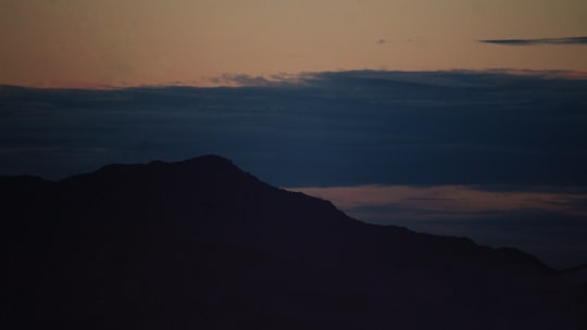 silhouette of mountain during sunset in Dehradun India