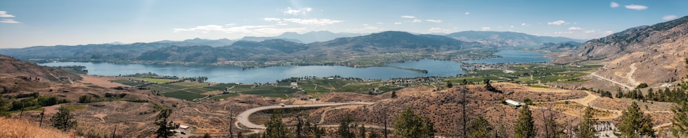 green trees and brown mountains during daytime