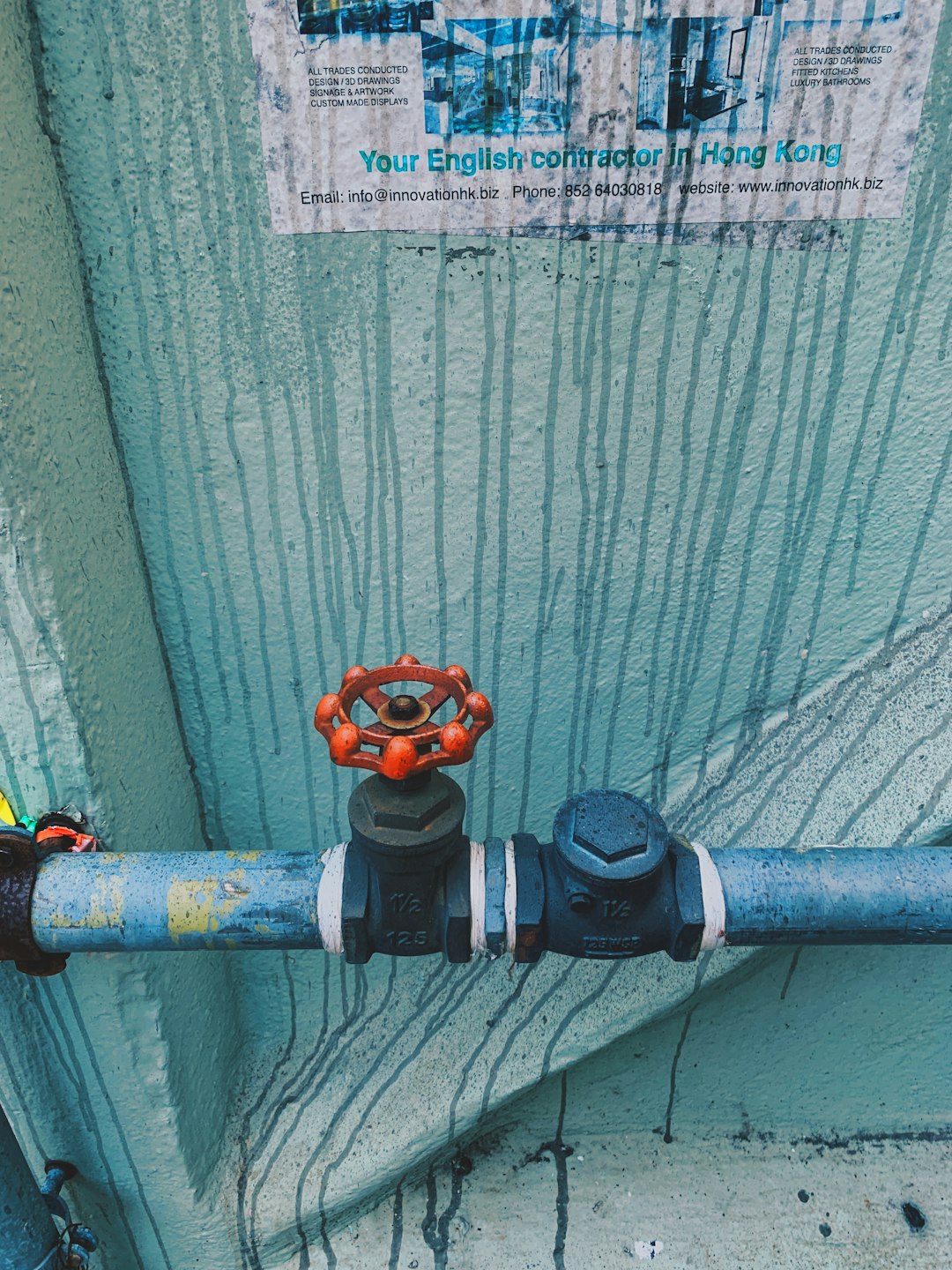 black and orange metal pipe