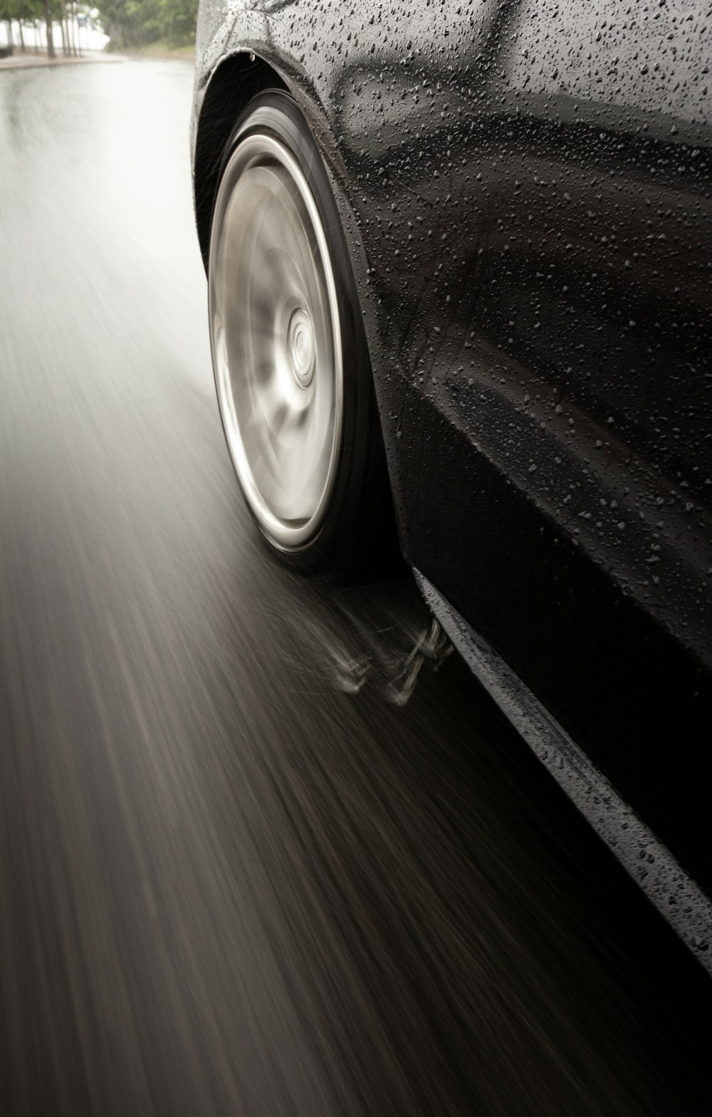 black car on road during daytime